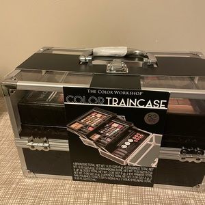 Brand new make up case with make up.